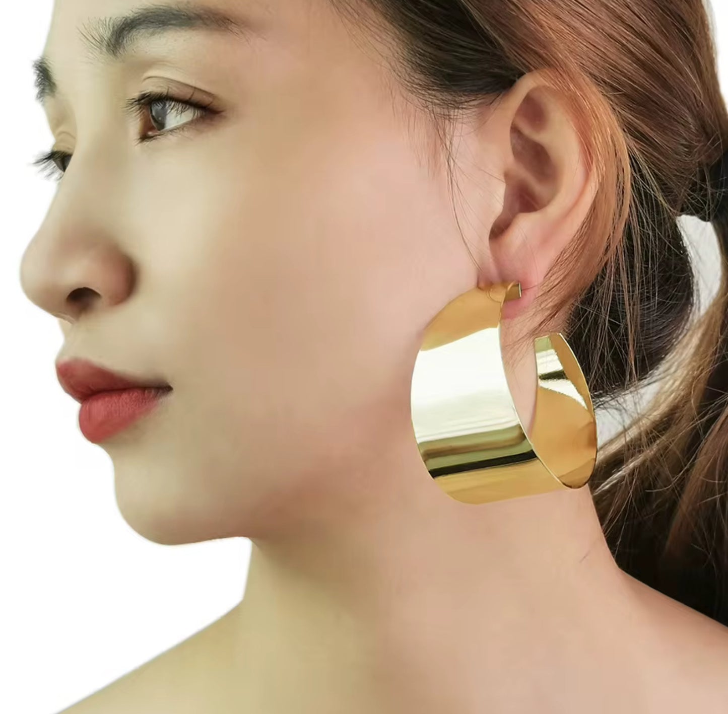 Boucle d’oreille en C luxe acier